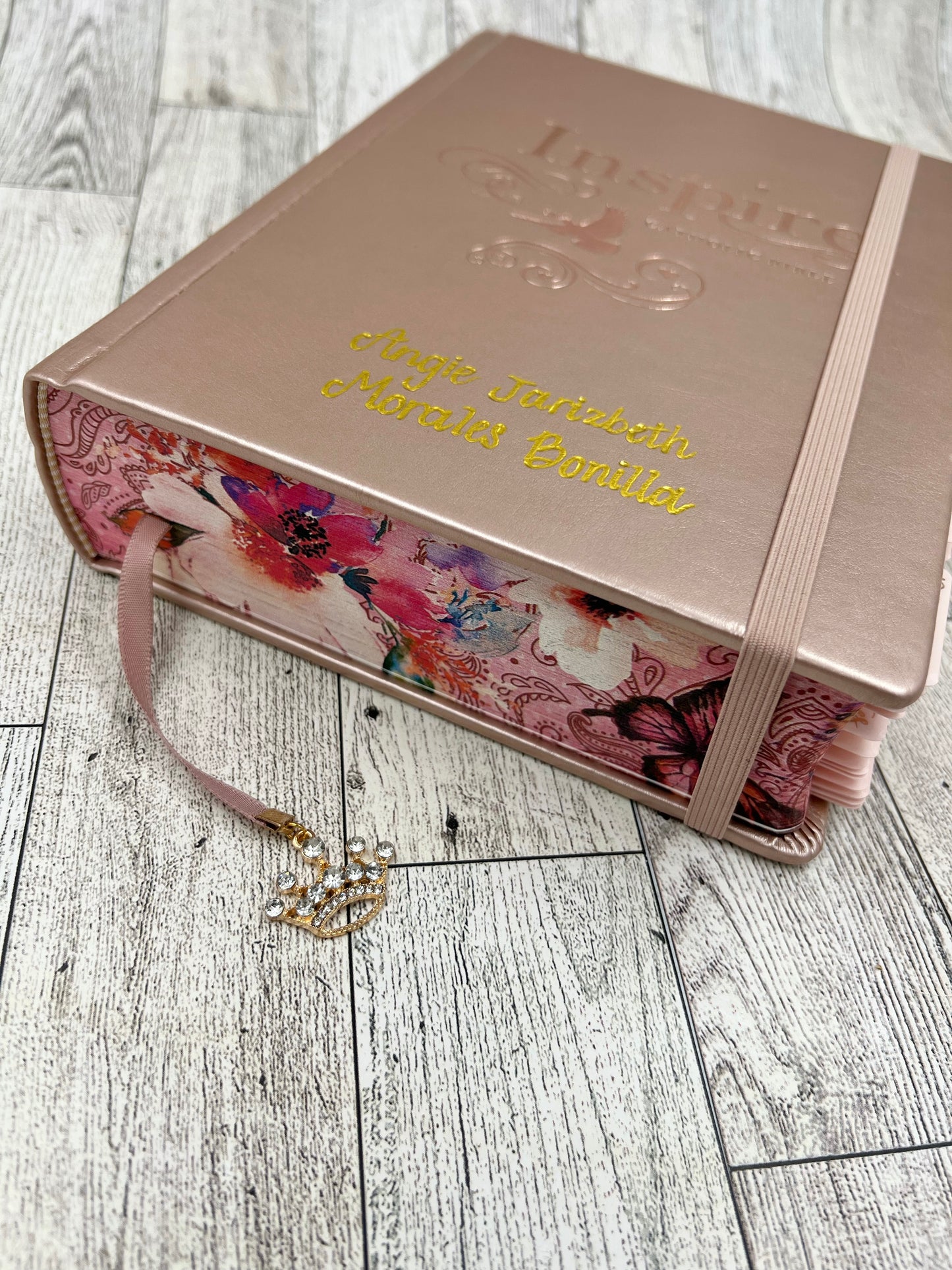 NLT INSPIRE CATHOLIC BIBLE (BIBLIA EN INGLES) ROSE GOLD (With tabs and crown charm)
