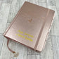 NLT INSPIRE CATHOLIC BIBLE (BIBLIA EN INGLES) ROSE GOLD (With tabs and crown charm)